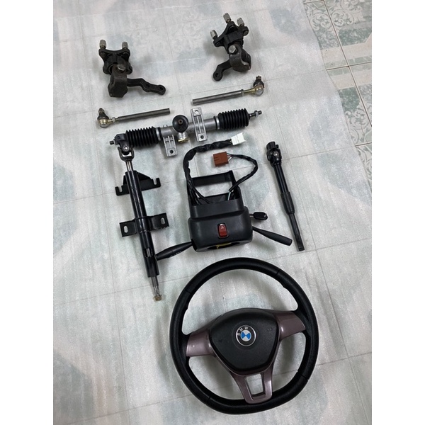 Bộ Hệ thống lái vô lăng xe 4 bánh đầy đủ,mai ơ tim ốc đo vuông 7cm,chéo 10cm,dùng chế xe 4 bánh lái vô lăng