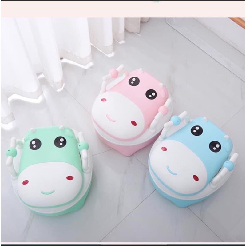 Bô vệ sinh cho bé hình bò sữa kute