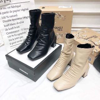 Bốt nhăn gót trụ cực chất