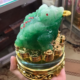 Ông cóc ngậm tiền đế xoay