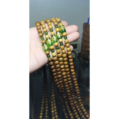 Bách xanh 108 hạt mix nu thống