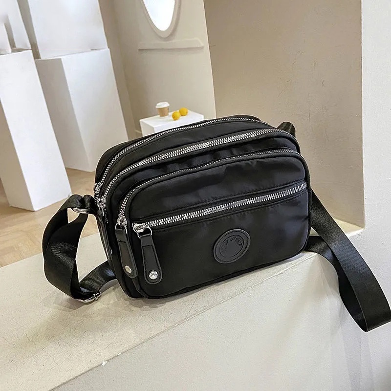 Túi Đeo Chéo Nhiều Ngăn Bằng Vải oxford nylon Nhẹ Nhàng bp054
