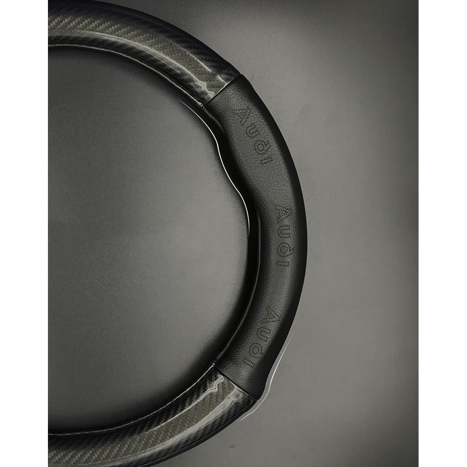 Bọc vô lăng xe ford everest focus ranger ecosport fiesta explorer transit escape chất liệu da vân cacbon