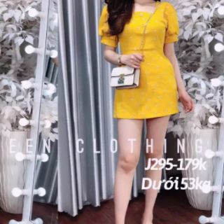 Đầm tay phồng in hoa phối nút