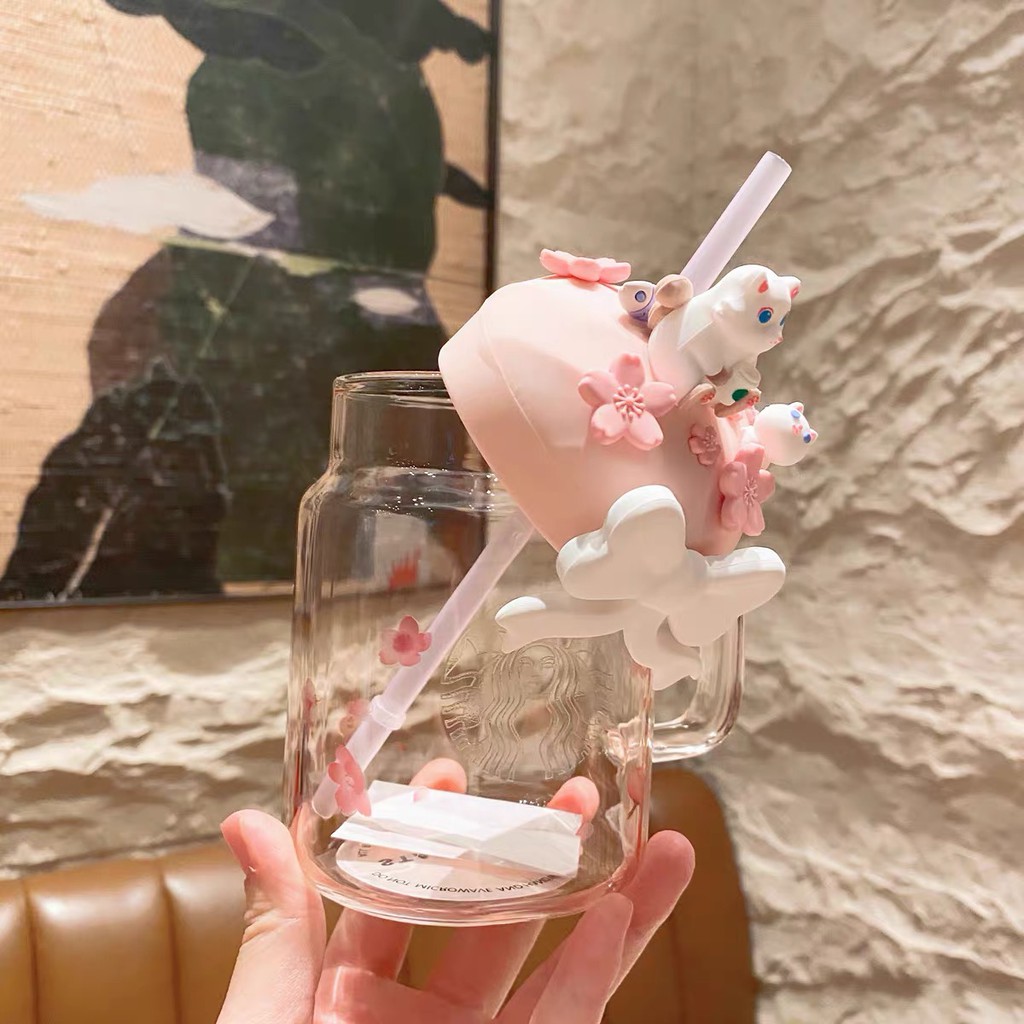 Ly thủy tinh STARBUCKS màu hồng Sakura có quai cầm và ống hút dung tích 400ml