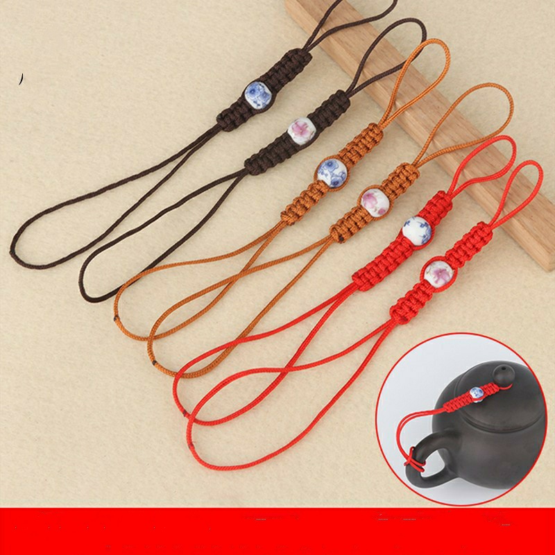 Dây buộc nắp ấm trà có hạt gốm, bảo vệ tránh rơi khi sử dụng và vệ sinh, thẩm mỹ cho ấm trà
