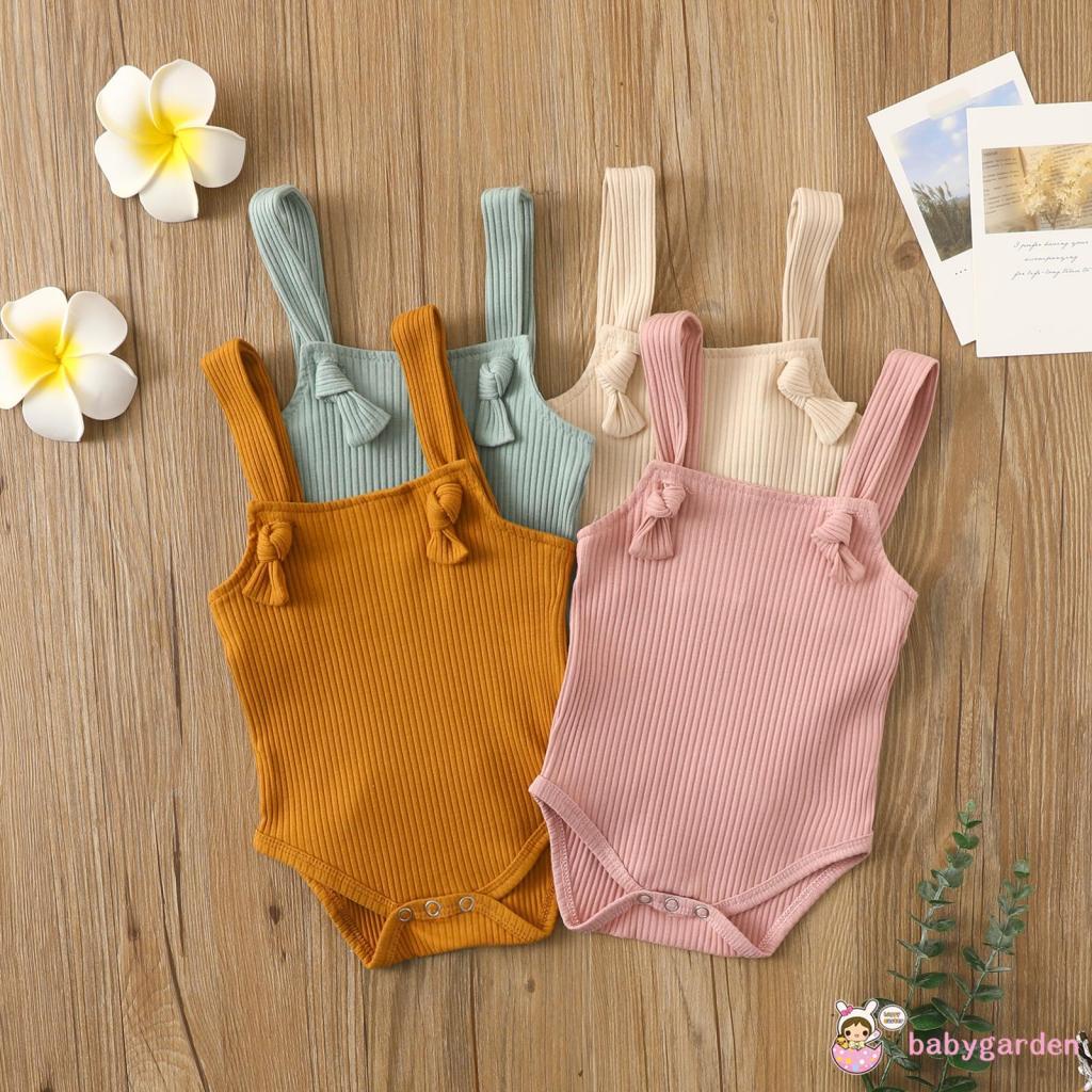 Áo liền quần có dây và nút màu trơn chỉnh được cho bé gái 0-24 tháng