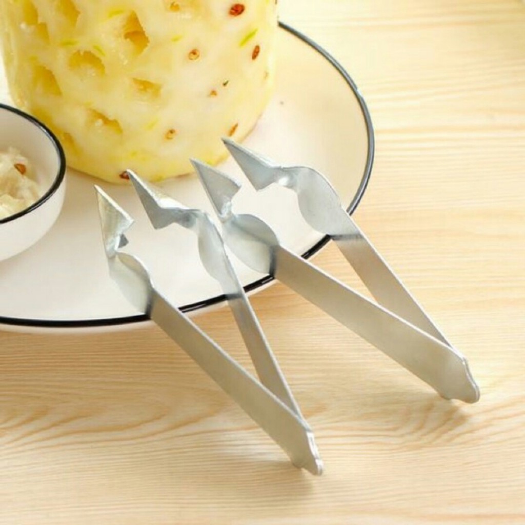 Dụng cụ gắp mắt dứa