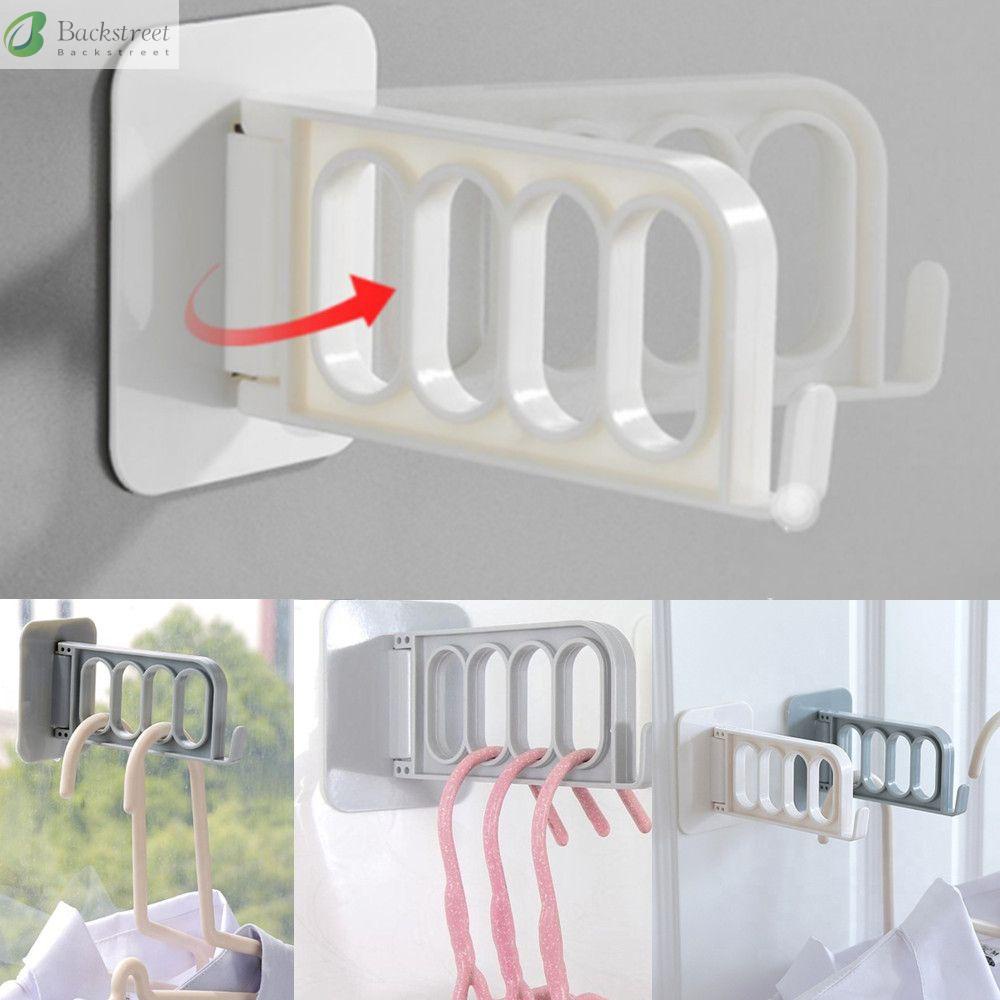 Giá đỡ treo quần áo 4 lỗ bằng nhựa gắn tường đa năng có thể gấp gọn