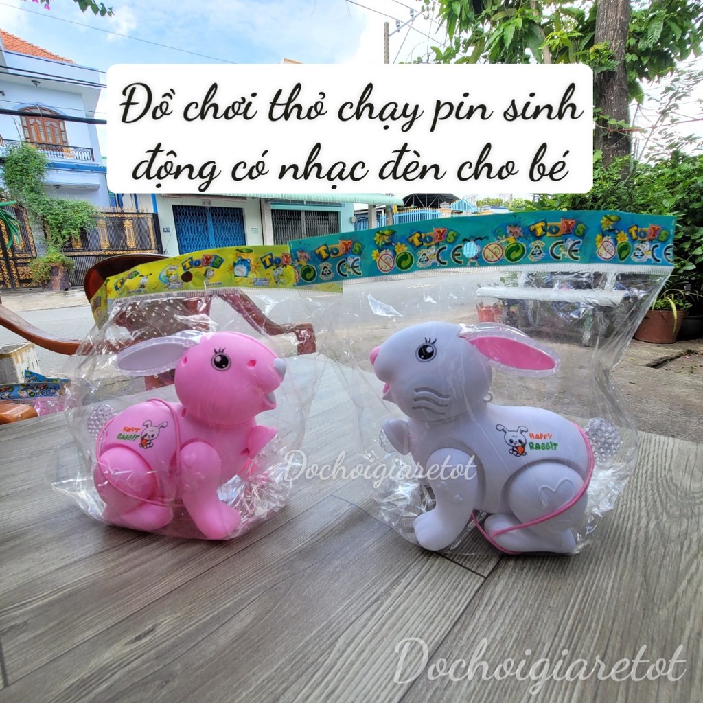 Đồ chơi con thỏ pin có nhạc đèn kèm dây dắt cho bé
