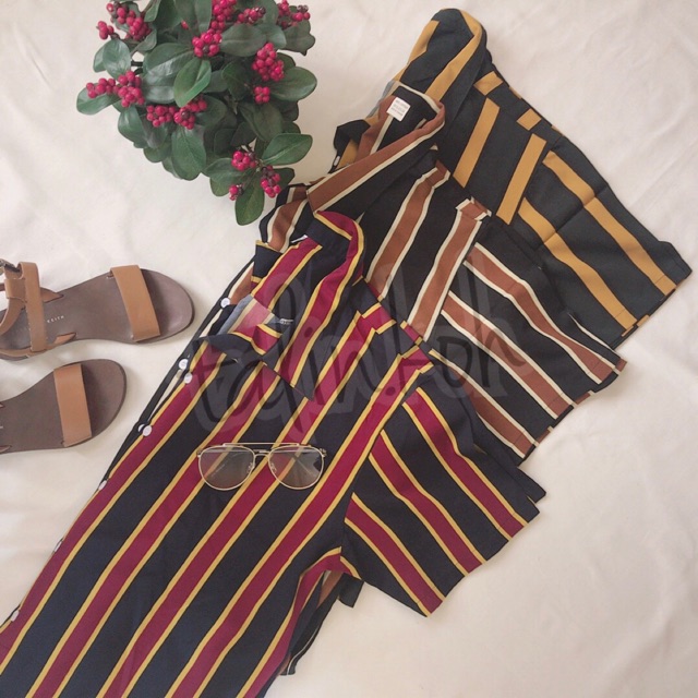 Flowing striped shirt with lapel collar and V-neckline