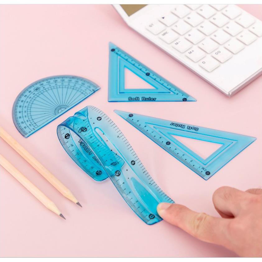 Bộ Dụng Cụ Học Tập Nhựa Dẻo Trong Suốt 4 Món Thước kẻ, Eke, Đo Độ Kèm Túi Đựng Cúc Bấm_Đồ dùng học t