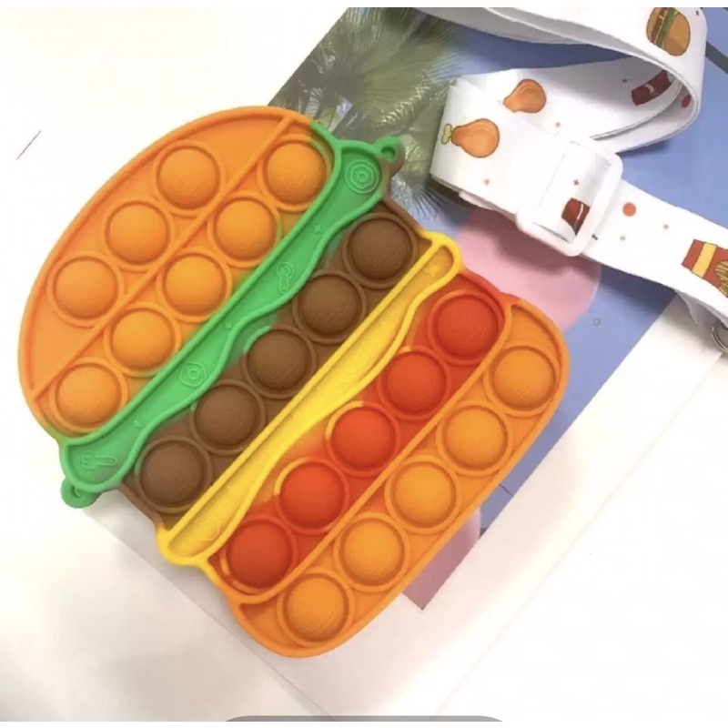 Túi đeo chéo nhỏ nhắn kiểu đồ chơi bấm bong bóng dễ thương cho trẻ em