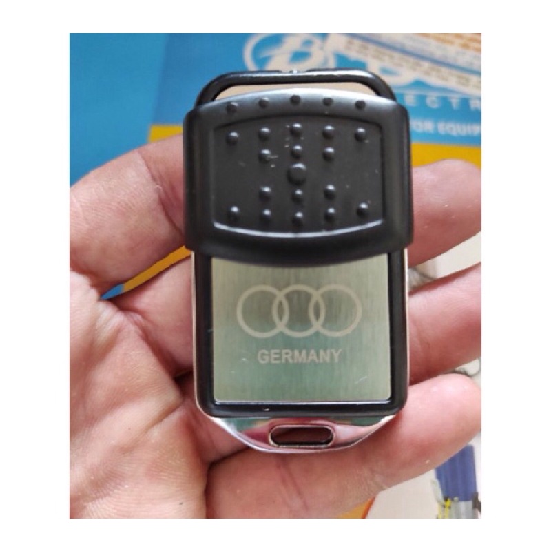 Remote cửa cuốn INOX mã gạt tần số 433MHZ