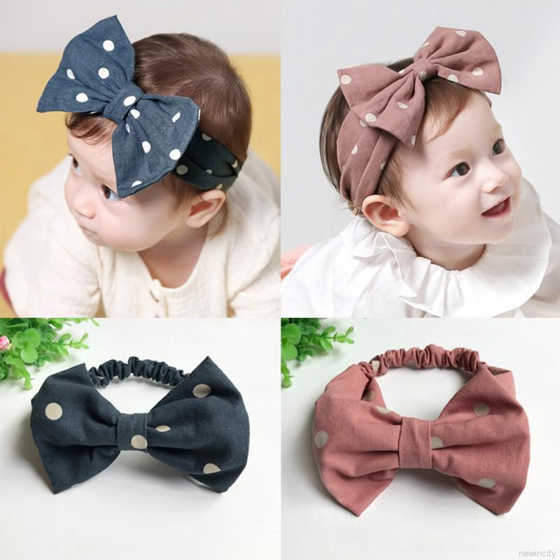 Băng đô nơ chấm bi đáng yêu cho bé