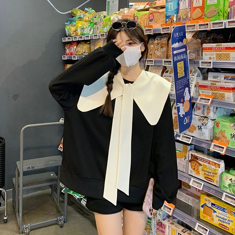 Áo Sweater màu đen đính nơ thời trang mùa thu cho nữ