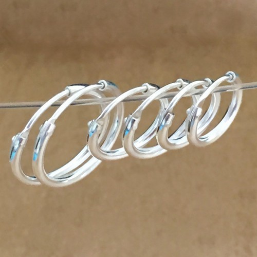 Khuyên cơ thể xi bạc dáng tròn