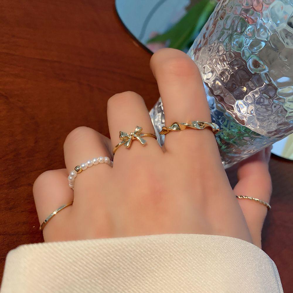 Set 4 / 5 Nhẫn Đeo Khớp Ngón Tay Bằng Hợp Kim Hình Bướm Đơn Giản Phong Cách Hàn Quốc Cho Nữ