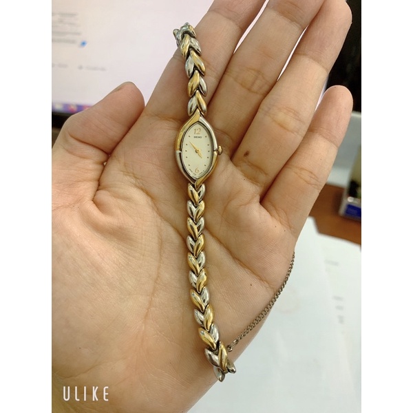 Đồng hồ si nữ hiệu SEIKO, dáng lắc, dây demi, mặt khảm trai