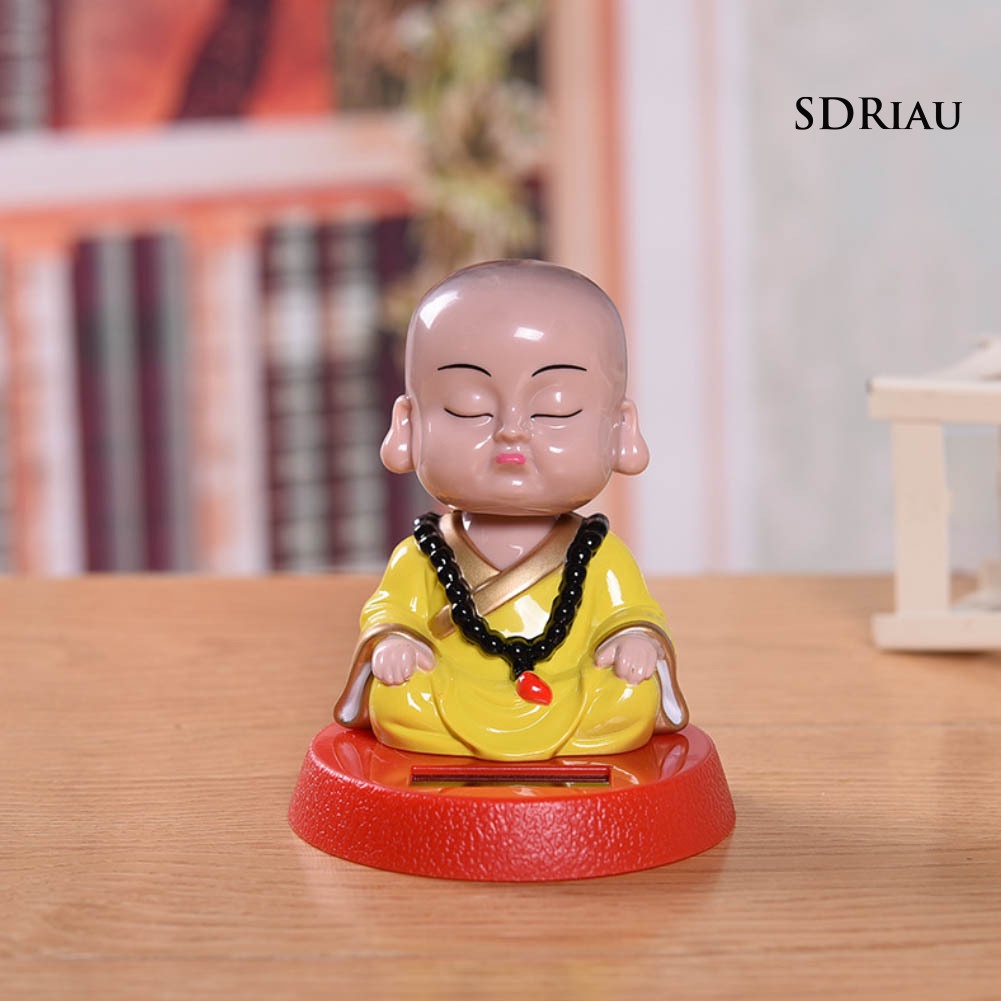 Đồ Chơi Tượng Chú Tiểu Hoạt Hình Sử Dụng Năng Lượng Mặt Trời