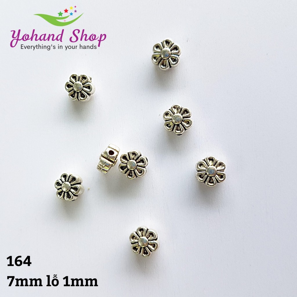 Mặt dây trắng 164 hoa mai ( gói 20 cái)