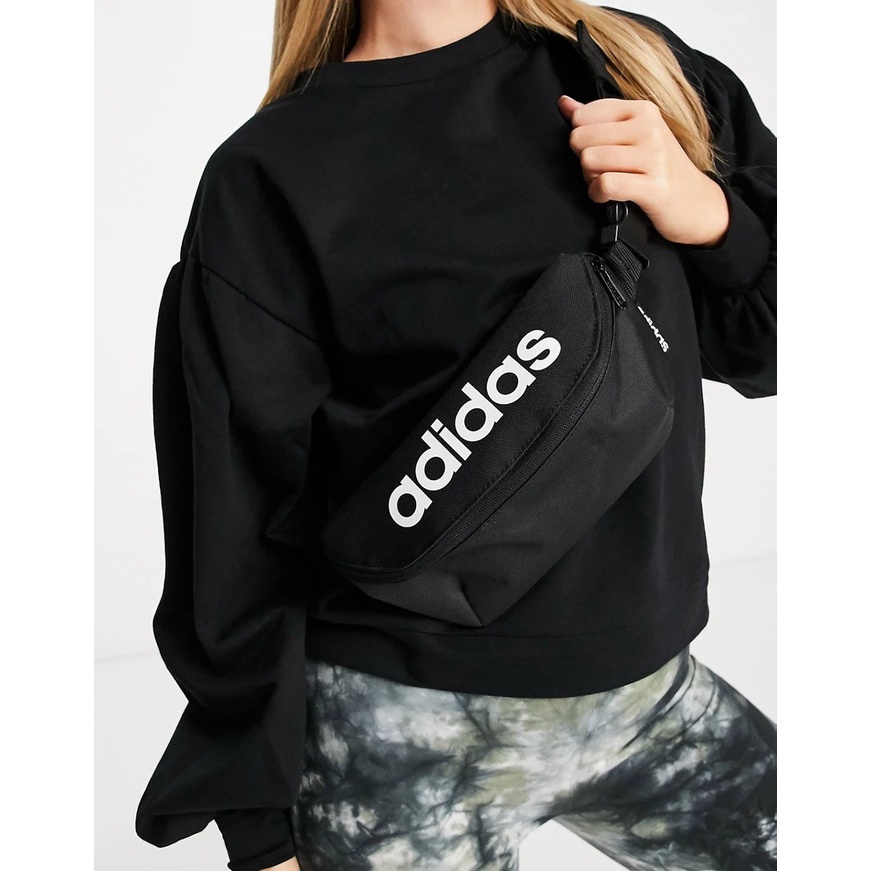 (HÀNG XUẤT XỊN) Túi bao tử das đen logo chữ dọc DAILY WAIST BAG BLACK GE1113 Kích thước: 15 cm x 27 cm x 9 cm