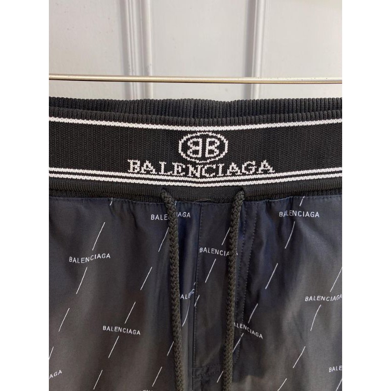 quần đùi lửng nam cạp chun có dây in logo chữ Balenciaga