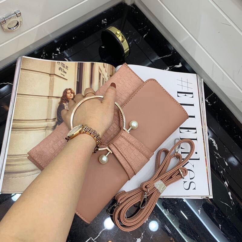 Clutch khoen ngọc qccc