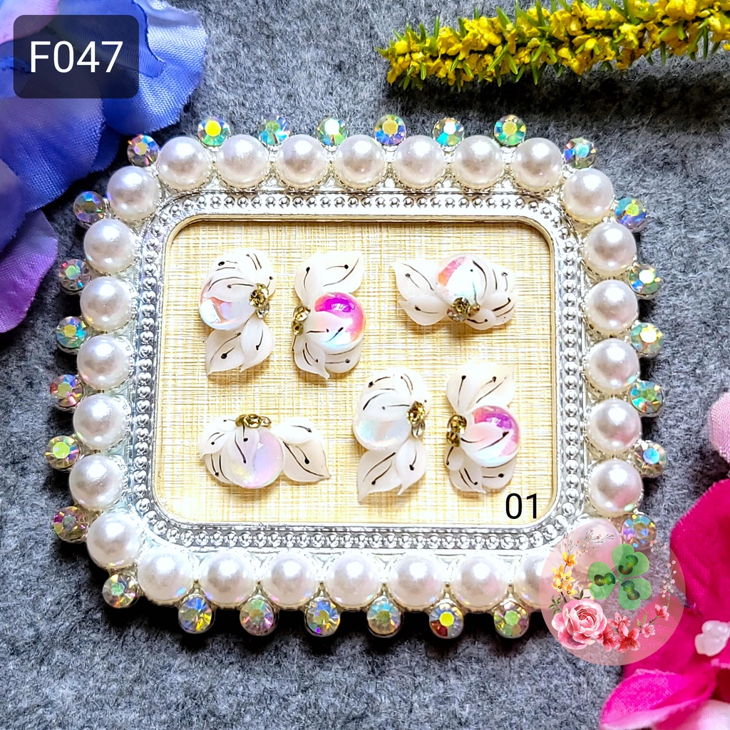Mẫu: F047 . Hoa bột " Hoa ôm đá cầu vồng " đính móng siêu xinh.