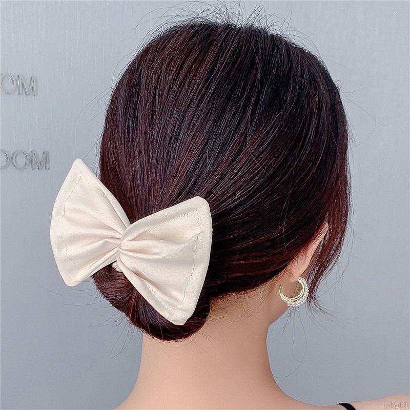 Kẹp xoắn tạo kiểu tóc búi nơ xinh xắn dành cho bạn gái
