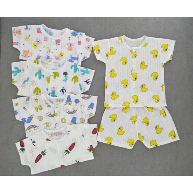 Bộ lửng tay cotton giấy cài cúc giữa mềm mai cho bé trai và gái