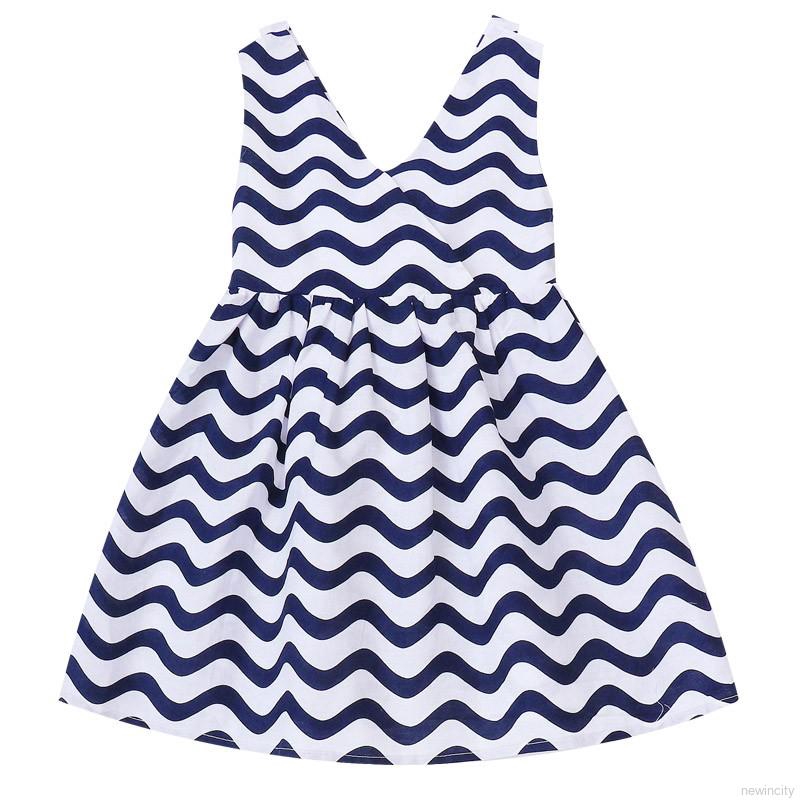 Đầm sát nách hở lưng họa tiết lượn sóng cho bé gái