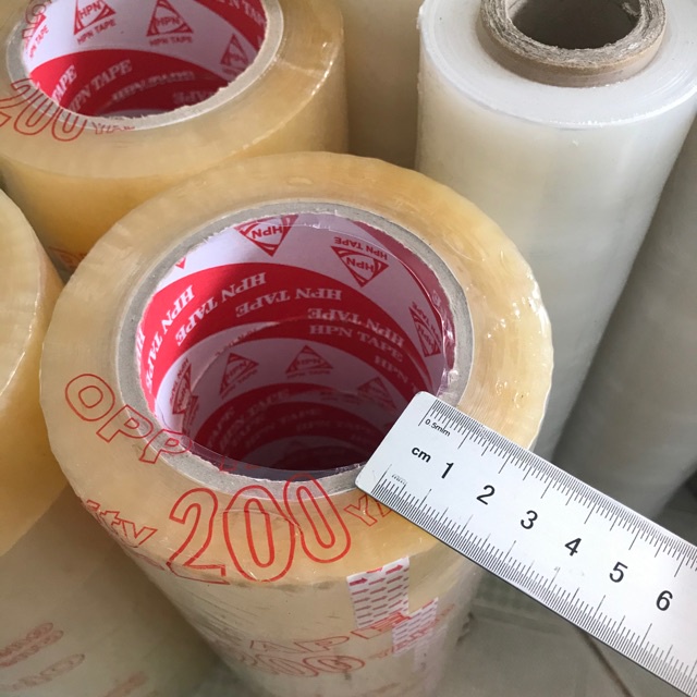 Băng Keo Opp 5F - 200Ya - 1.8kg/Cây  Trong - Đục Chất Dẻo Dai Dùng Dán Thùng Giấy Hàng Hóa Văn Phòng