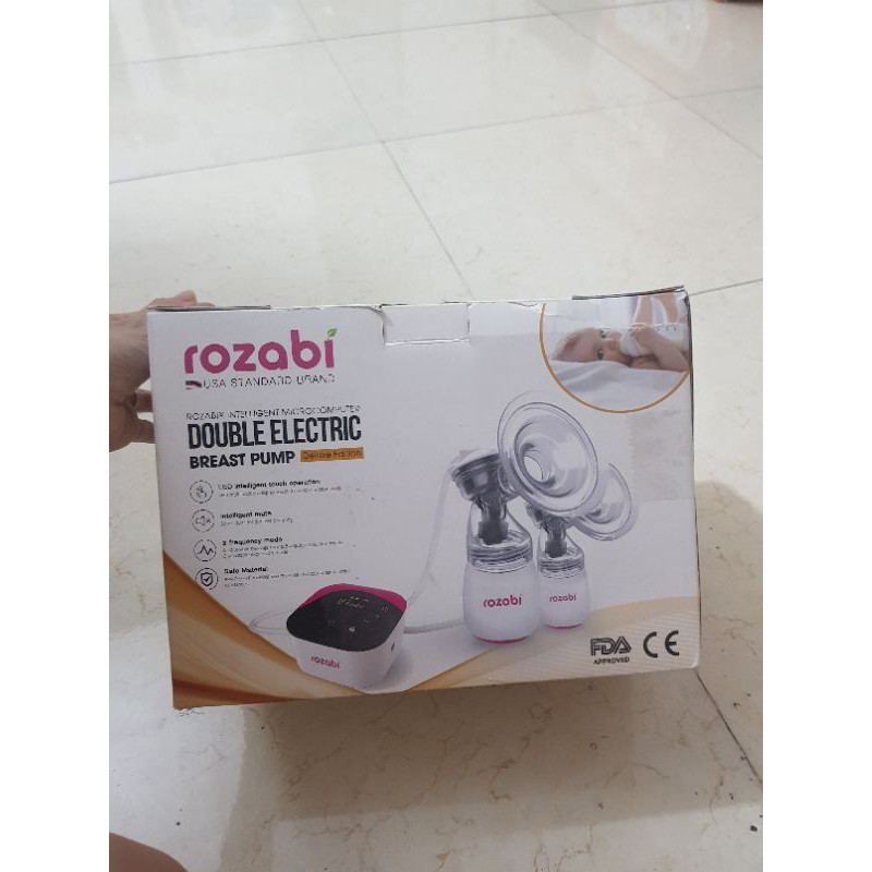 Thanh lý máy hút sữa điện đôi ROZABI dulex ít sử dụng vì bé k hợp tác bú bình