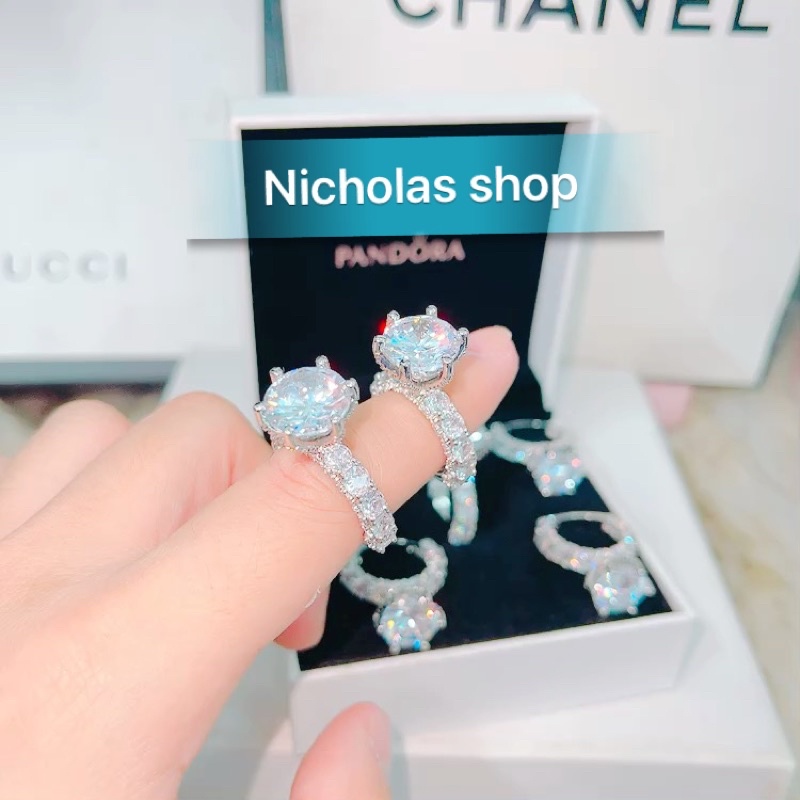 Nhẫn đính đá ổ hoa mạ bạch kim