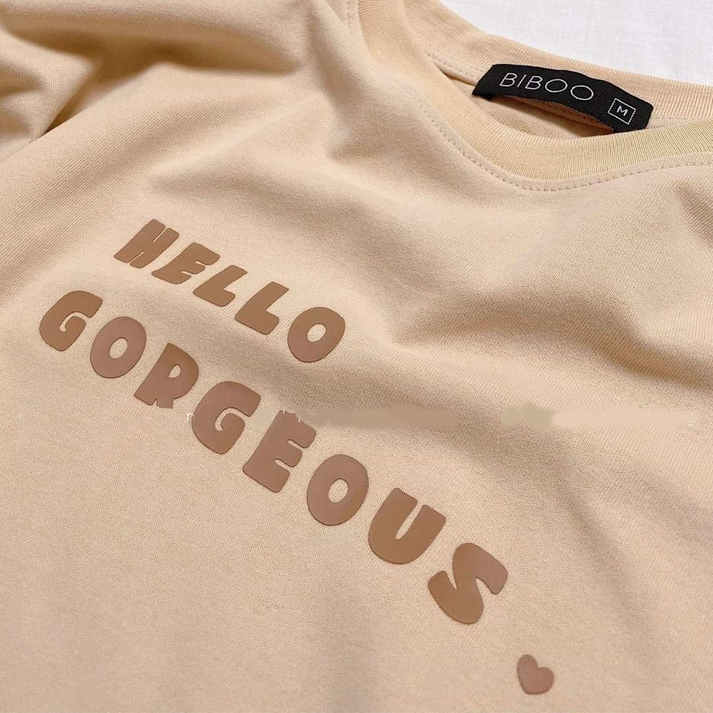 Áo thun nữ form rộng gam màu be sang chảnh mặc tôn da in chữ hello godgeous cao cấp hiện đại bán chạy giá tốt