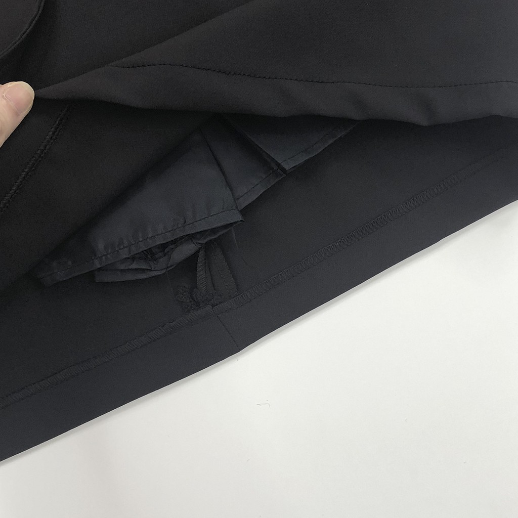Chân váy chữ A công sở GINDY hai màu đen kem, cạp cao, phối đai chéo đai trẻ trung thời trang V5130