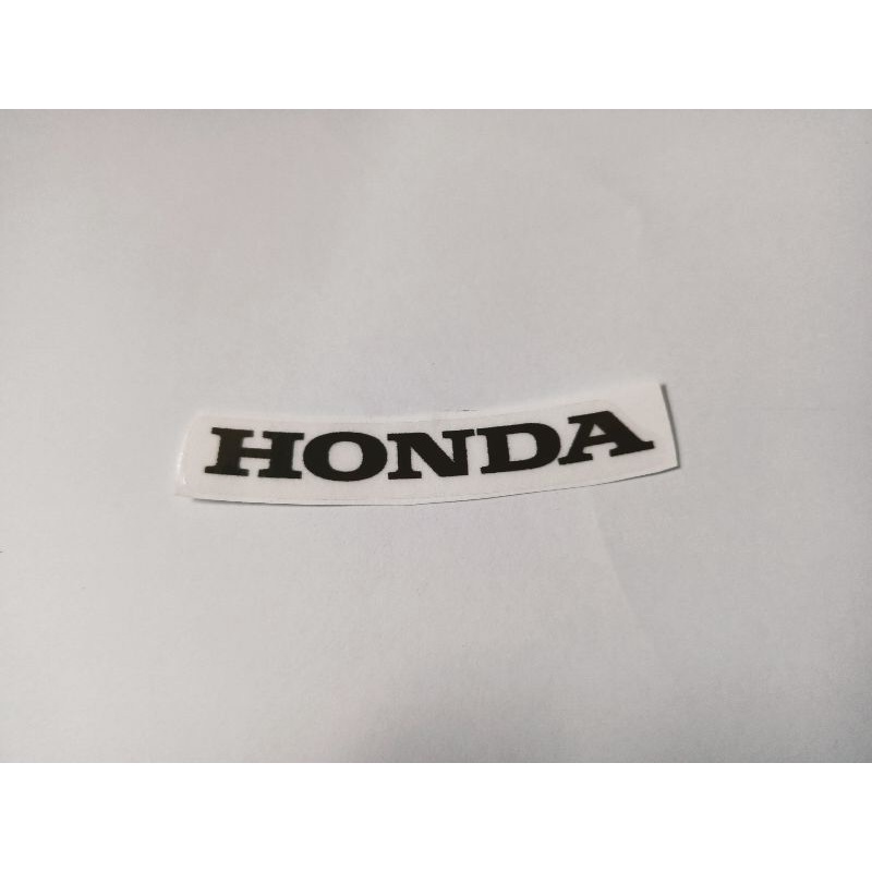 Tem trang trí mặt nạ xe Honda màu đen nền trong