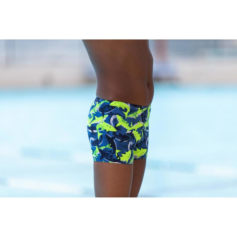 Quần bơi boxer Decathlon NABAIJI 500 fit cho bé trai - họa tiết cá mập vàng xanh dương size 8 Tuổi