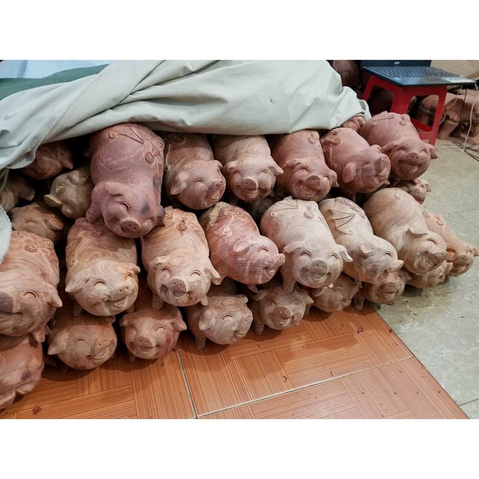 cặp lợn gỗ hương ta