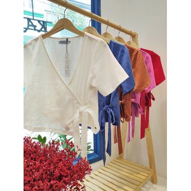 Áo nơ buộc eo cổ V