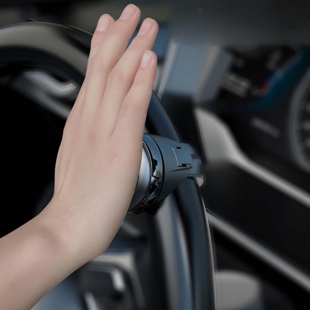 Núm xoay vô lăng xe hơi xoay 360 độ bằng nhựa và kim loại tiện dụng