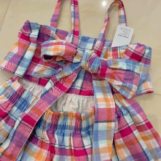 Đầm caro buộc nơ sau new tab