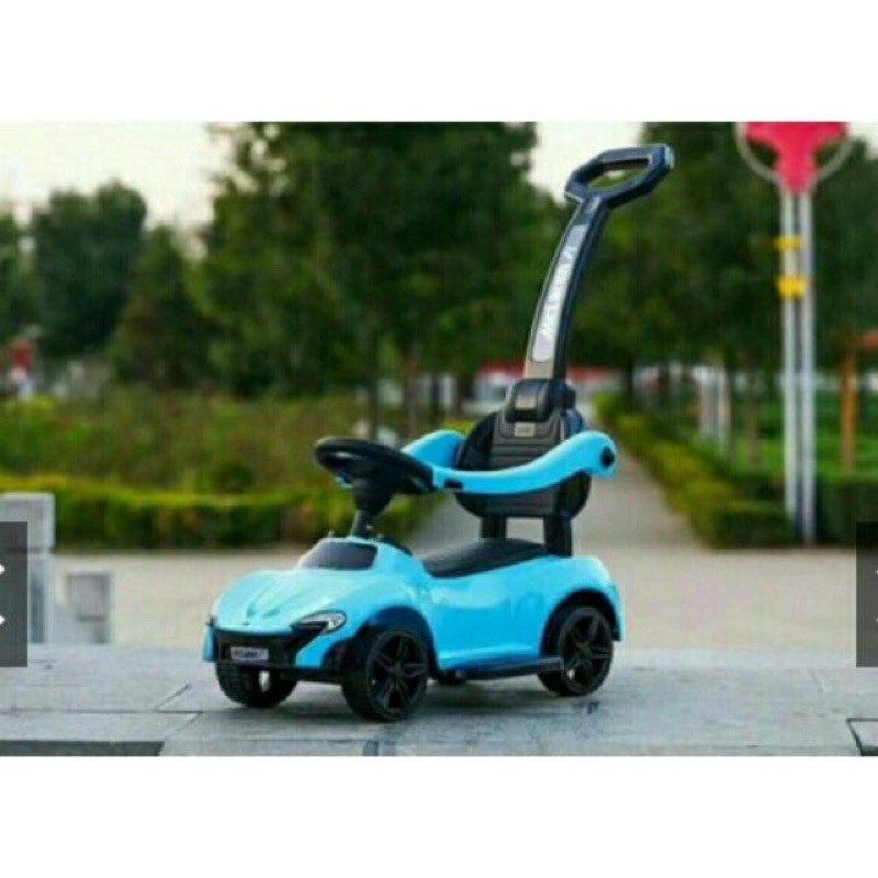 Xe ô tô xe chòi chân có  cán đẩy có nhạc bảo hiểm