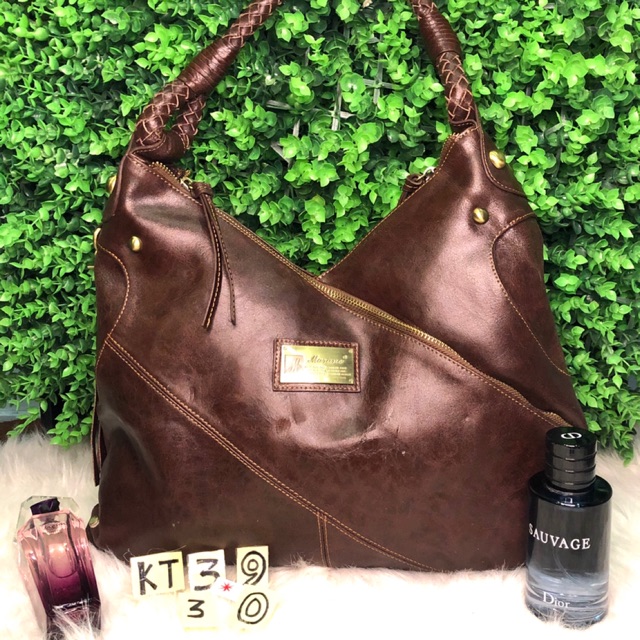 Túi xách kiểu dáng lạ,da thật,Hiệu