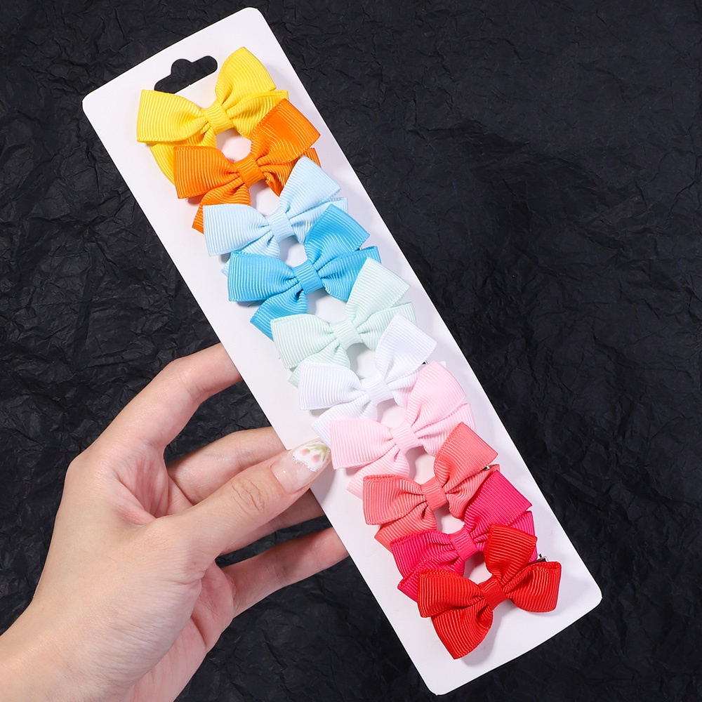 Set 10 kẹp tóc nơ KIDSBOWS bằng kim loại màu trơn phong cách Hàn Quốc thời trang cho bé gái