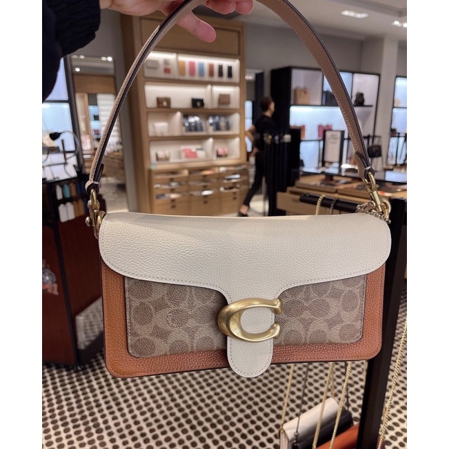 Túi coach kẹ nách