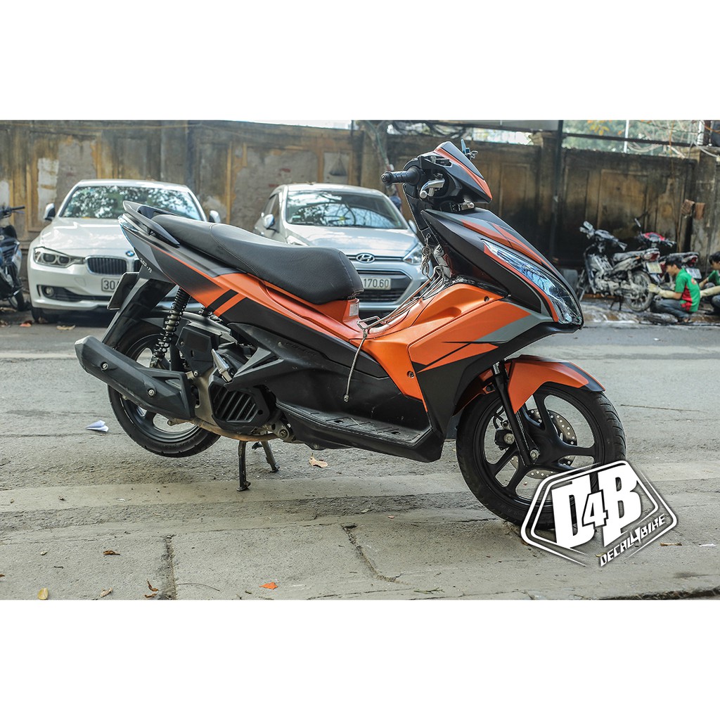 Tem trùm xe Air Blade 2014 phối màu cam đen