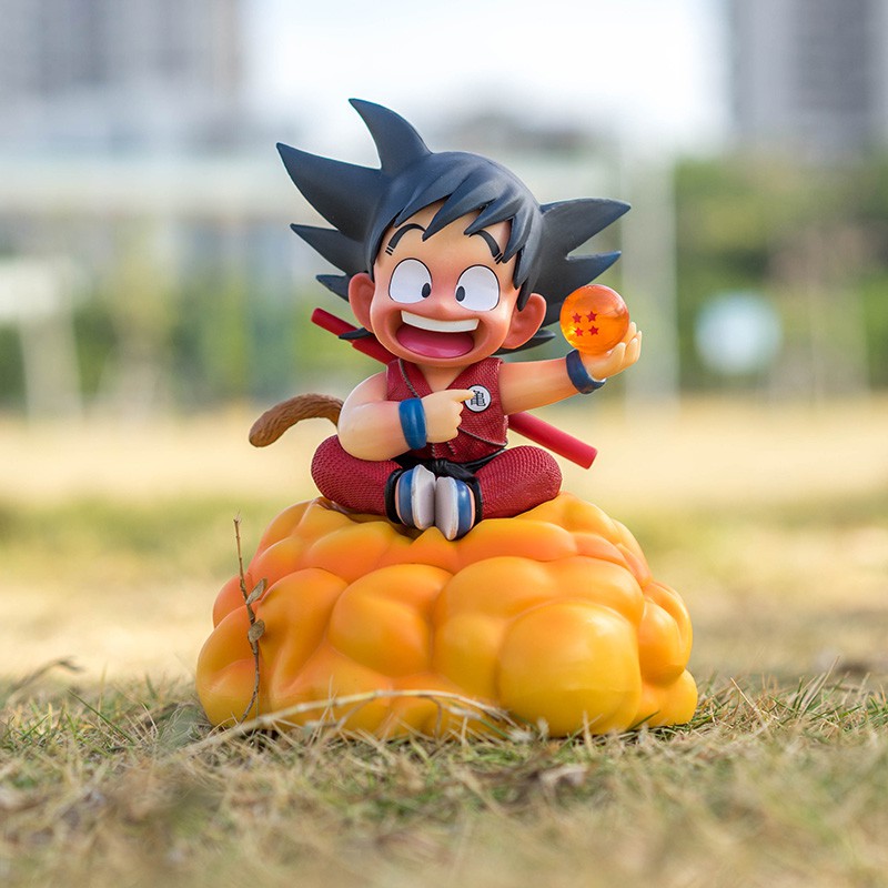 Mô hình Dragonballz Goku Kid ngồi cân đẩu vân tay cầm ngọc rồng