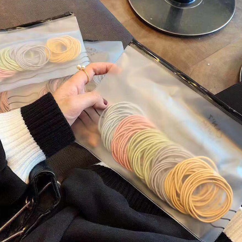 Set 100 dây thun cột tóc nữ co giãn nhiều màu kèm túi Zip, phụ kiện tóc CT000 - Filibra